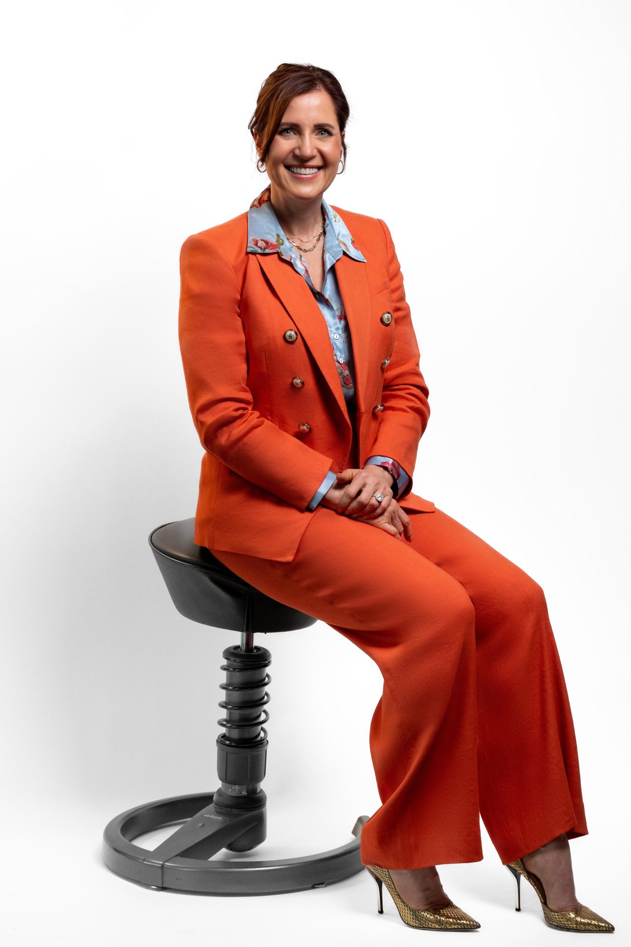 Rosa sitting in a chair